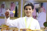 “ريان غنام” اصغر بائع بمهرجان العسل في الباحة
